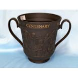 A Royal Doulton basalt double handled mug Dickens Centenary Ltd edition loving cup in original