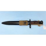 A BRITISH no5 Mk1 pattern Jungle carbine bayonet and scabbard, the blade etched STERLING but