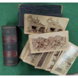 A cased selection of 'South African War through the stereoscope' in the form of a book, Volume 1.
