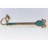 A bar brooch set turquoise and seed pearls