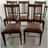 A late 19th / early 20th century set of 5 mahogany chairs with boxwood inlay, pierced detail to