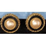 A pair of Chanel earrings with central domed pearl effect with gilt surround clip-on earrings (minor