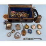 A 19th century rosewood jewellery box containing a silver hand bell (a.f.); costume jewellery;