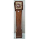 An art deco granddaughter clock with inlay around the face, with chiming movement. Height: 140cm