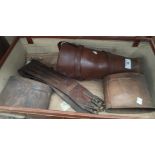 A pair of leather spats and a belt; 2 leather suitcases