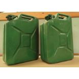 A 1952 military Jerry can and another similar one in green.