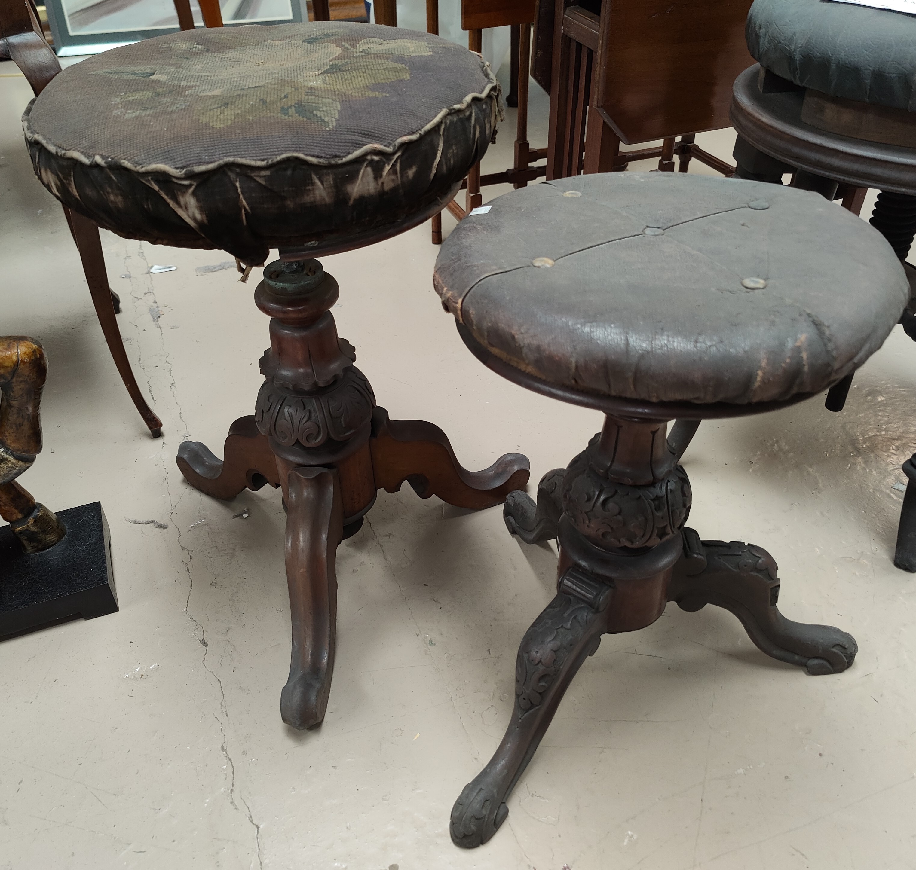 Two Victorian revolving piano stools; a mahogany miniature 3 height chest of drawers one stool a.f