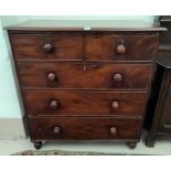 A Victorian mahogany chest of 3 long and 2 short drawers, with knob handles