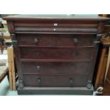 A Victorian figured mahogany large chest of 3 long, 2 short and 1 pulvinated frieze drawers,