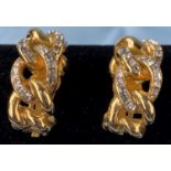 A pair of large Christian Dior gilt clip-on earrings of linked hooped form