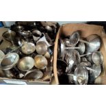 A large selection of silver on brass goblets of different sizes and shapes