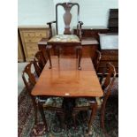 A 1930's mahogany dining suite in the Queen Anne style comprising extending table with rectangular