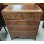 A small reproduction mahogany chest of 3 long and 2 short drawers