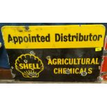 A Shell Appointed Distributor Agricultural Chemicals enamel sign and a Cadburys Golden Crisp sign