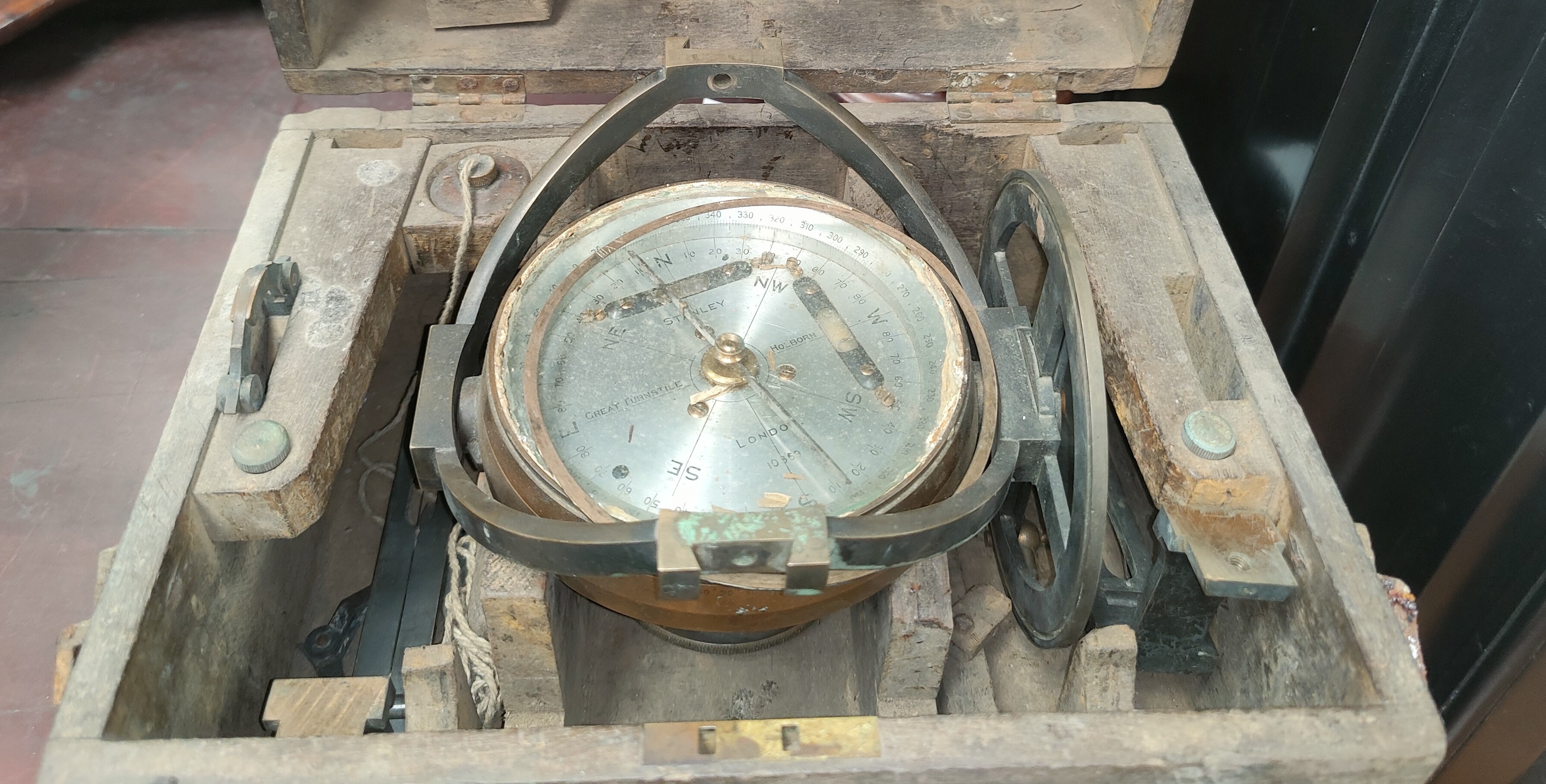 A cased Stanley Great turnstile Holborn ship's compass