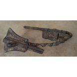 An 18th century Tibetan cast iron temple lock and key