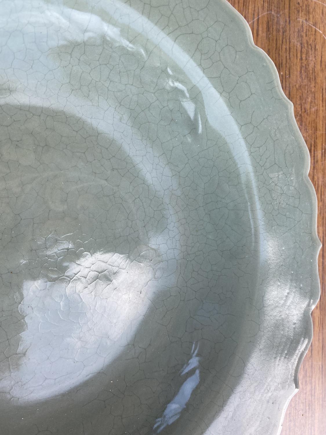 A Chinese celadon glaze dish with scalloped border, diameter 31cm and a carved Chinese hardwood - Image 2 of 4