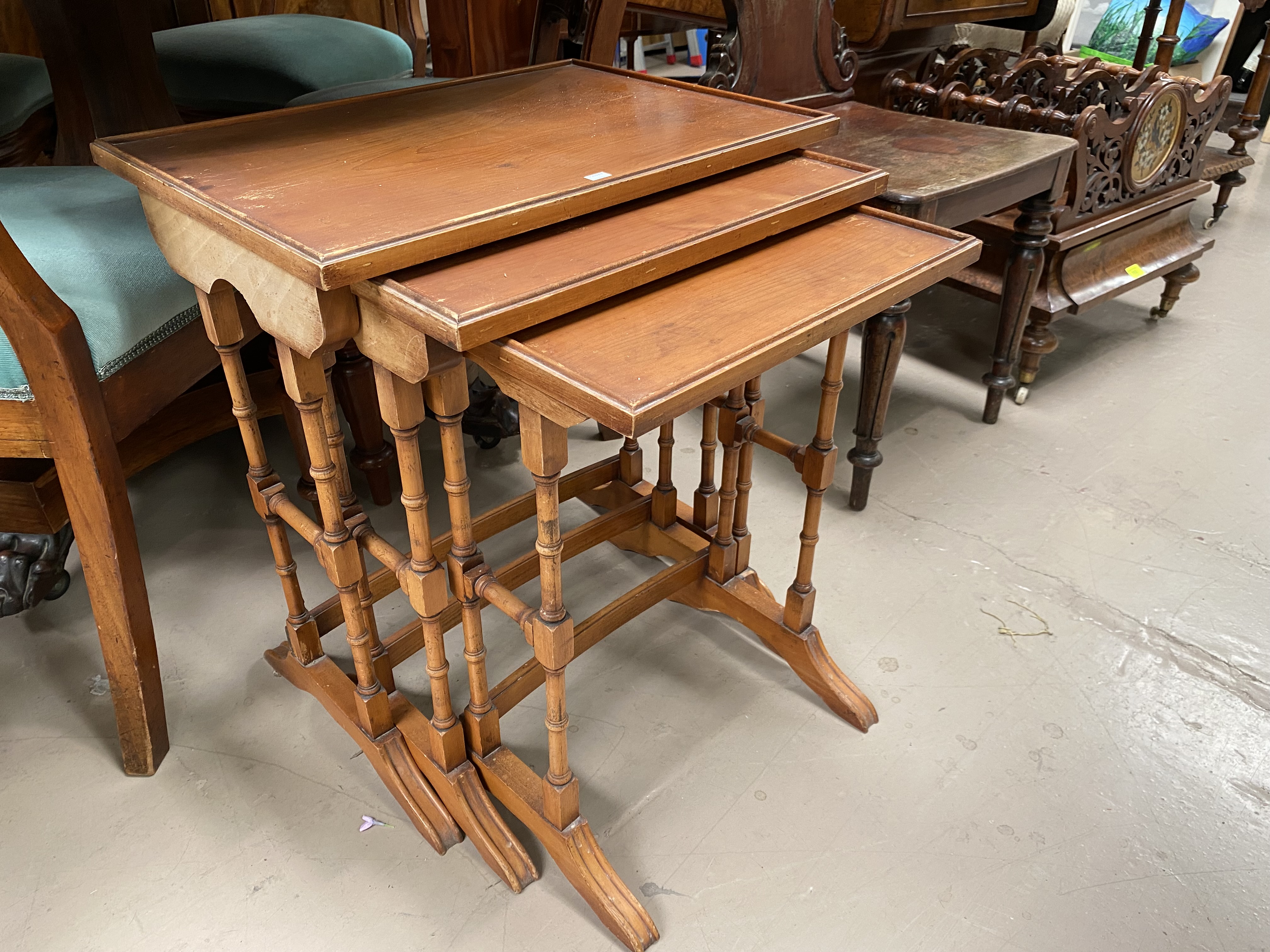 A yew wood reproduction set of 3 trio tables and similar 4 height chest of drawers