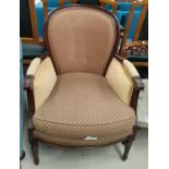 A 'Wesley Hall' armchair in gold upholstery and two other chairs