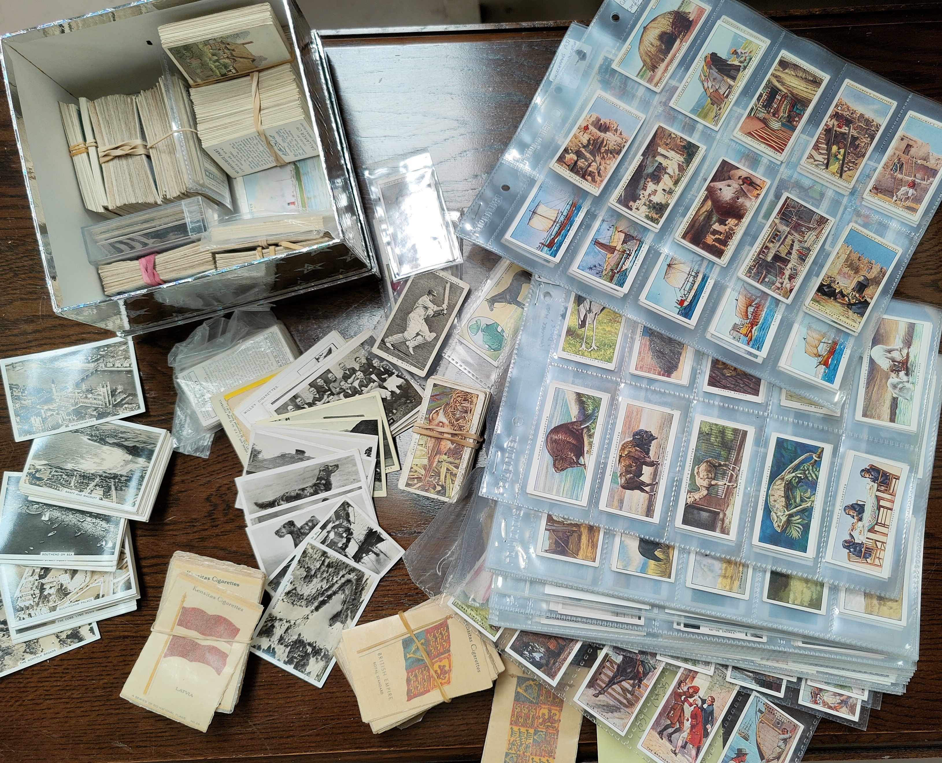 Ten assorted sets of Players, Ogden and other cigarette cards and Kensitas Silks cards