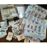 Ten assorted sets of Players, Ogden and other cigarette cards and Kensitas Silks cards