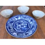 A Chinese squared blue and white bowl (restored); a blue and white dish and three Chinese Tek Sing