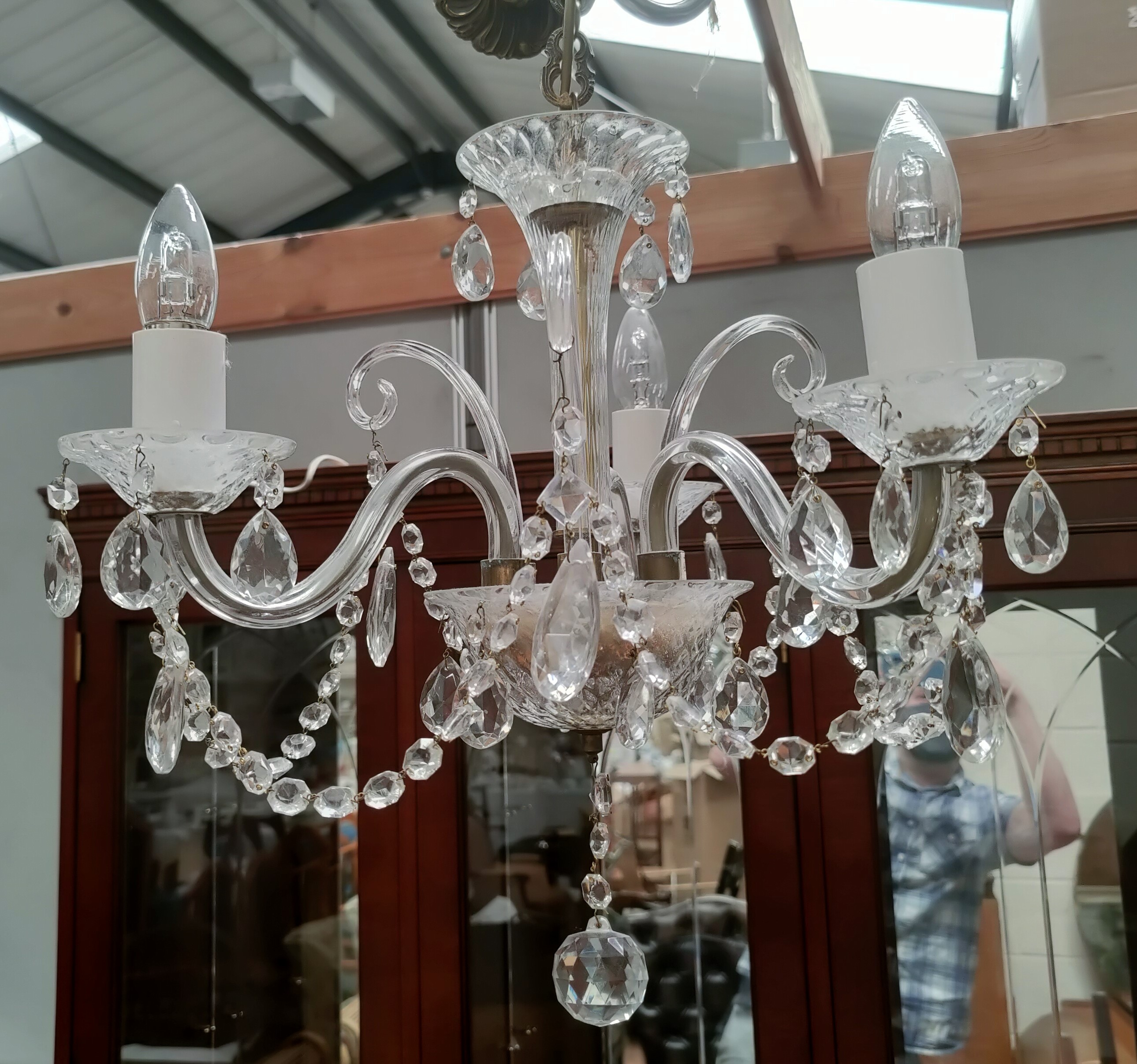 An antique crystal chandelier of 3 branches