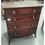 A mahogany bachelor's chest of four drawers and satin wood edging (Some areas of splitting top and