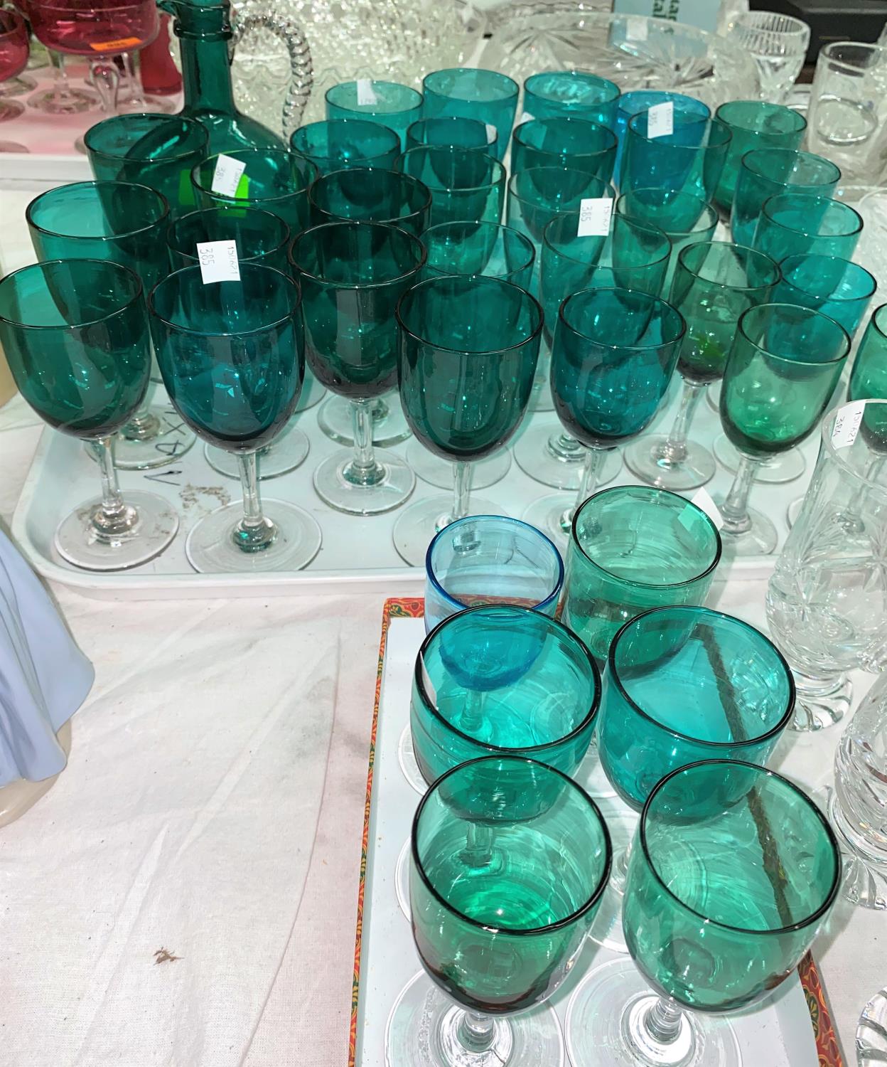 A Victorian turquoise glass wine jug; 35 approx similar wines