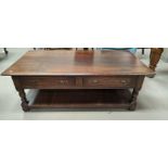 A large oak coffee table with 2 drawers, panelled under shelf, by Arighi Bianci, length 130cm x