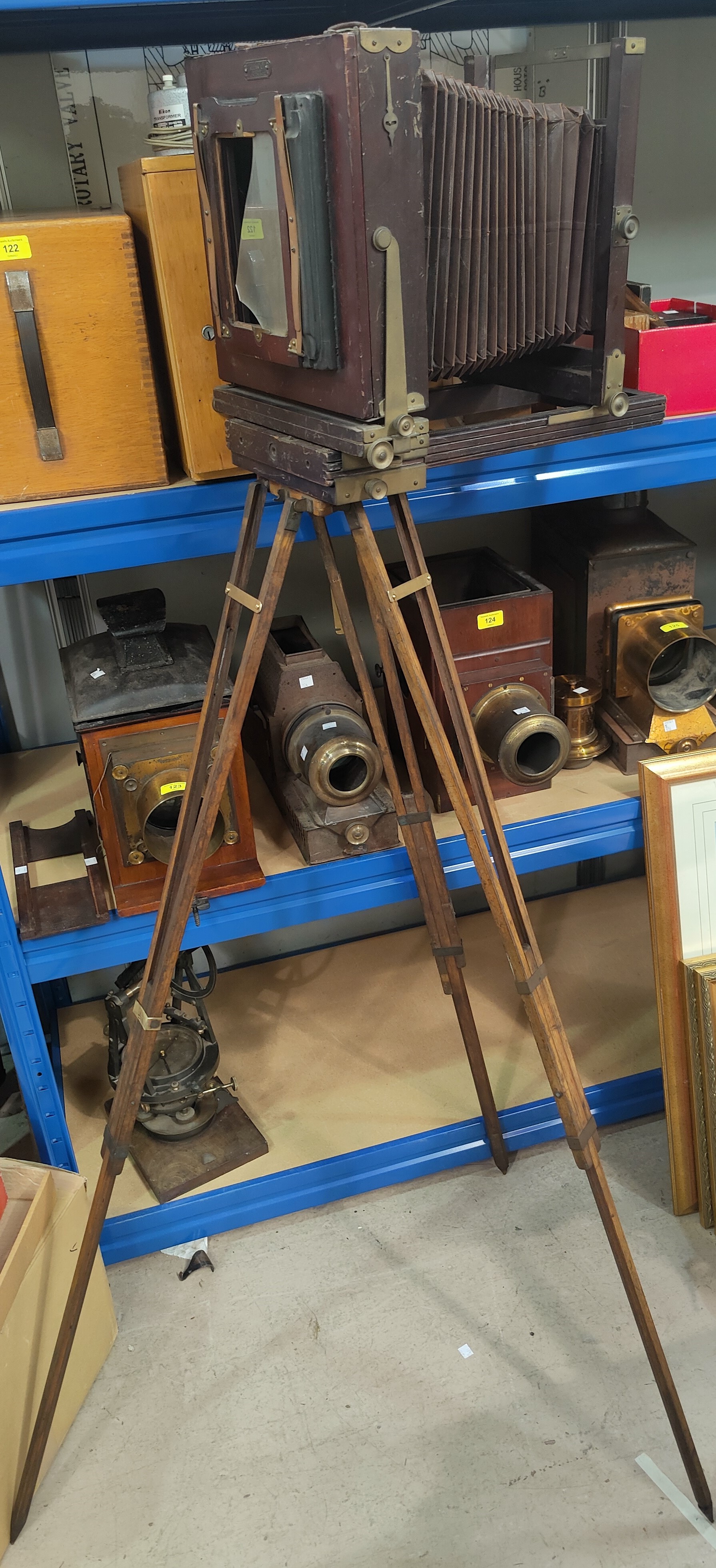 An antique Kodak plate camera on stand