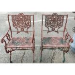 A pair of Victorian style unusual cast metal garden arm chairs