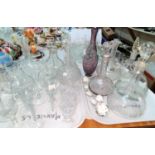 A selection of Victorian etched glass decanters and other glassware