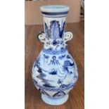 A Chinese blue and white baluster vase with bird decoration height 24cm