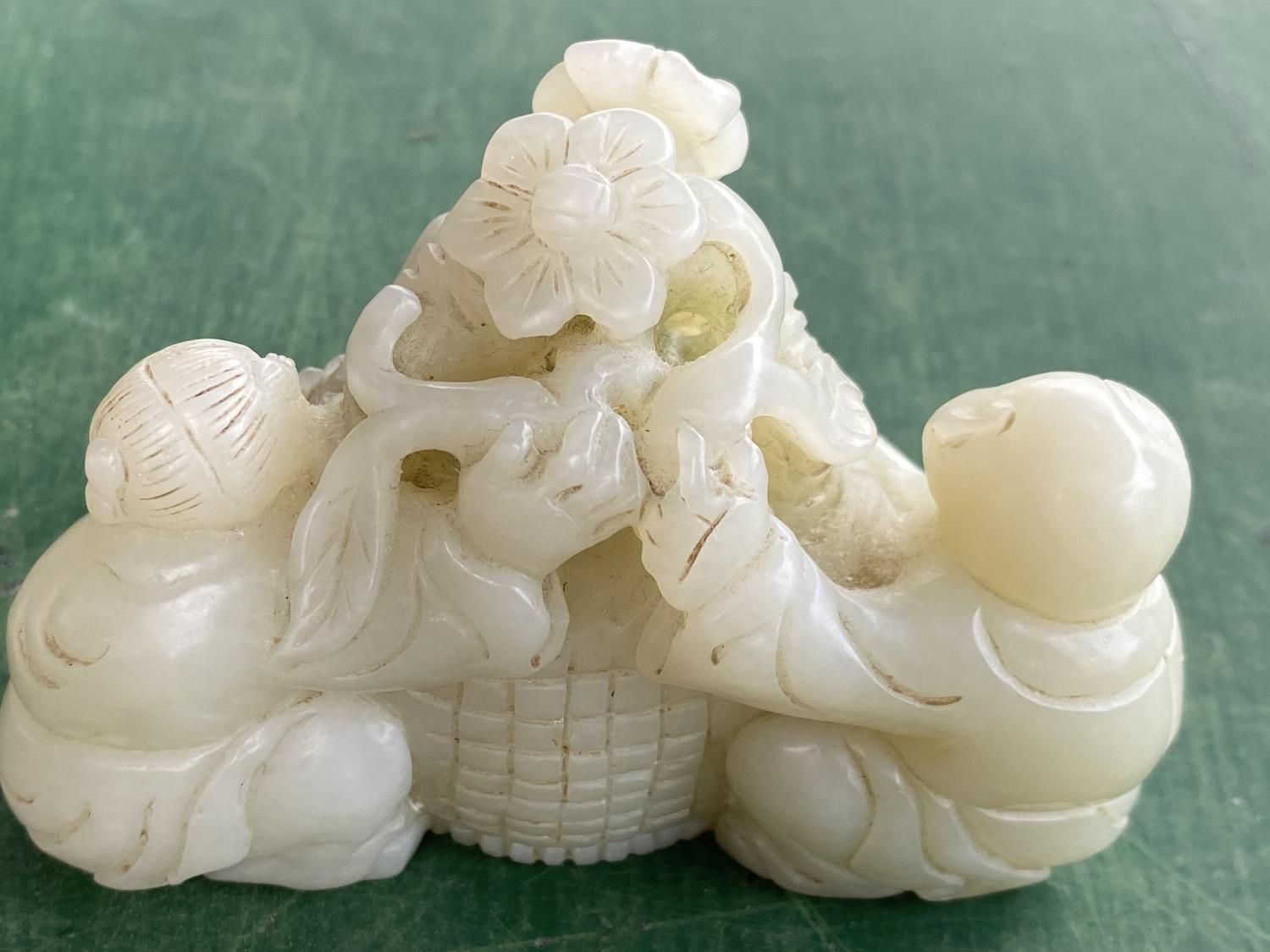 A Chinese jade coloured hardstone group of a young girl and boy with central basket of flowers - Image 3 of 5