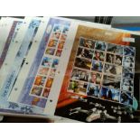 A collection of 5 Royal Mail "Smilers" sheets, 100 1st class stamps 2001/2002. 7 further sheets with