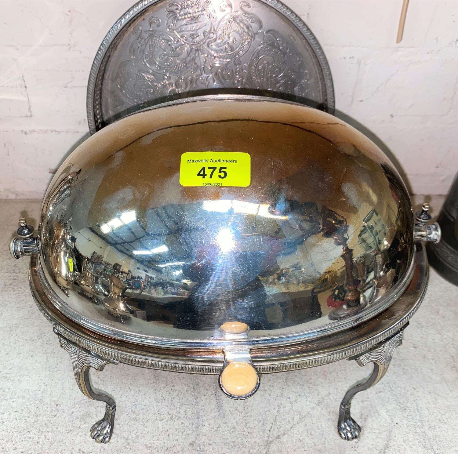 A silver plated breakfast dish with swivel top