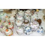 A selection of miniature teapots and decorative china