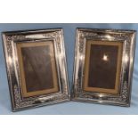 A pair of hallmarked silver surround photo frames, 18 x 14cm, Sheffield 1988