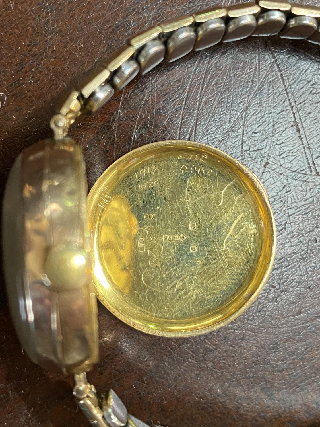 A lady's 9 carat wristwatch with import marks for Glasgow 191, on Excalibur gold plated expanding - Image 3 of 3