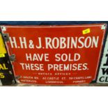 An early 20th Century enamel sign HH & J Robinson Sold These Premises, 57 x 42cm