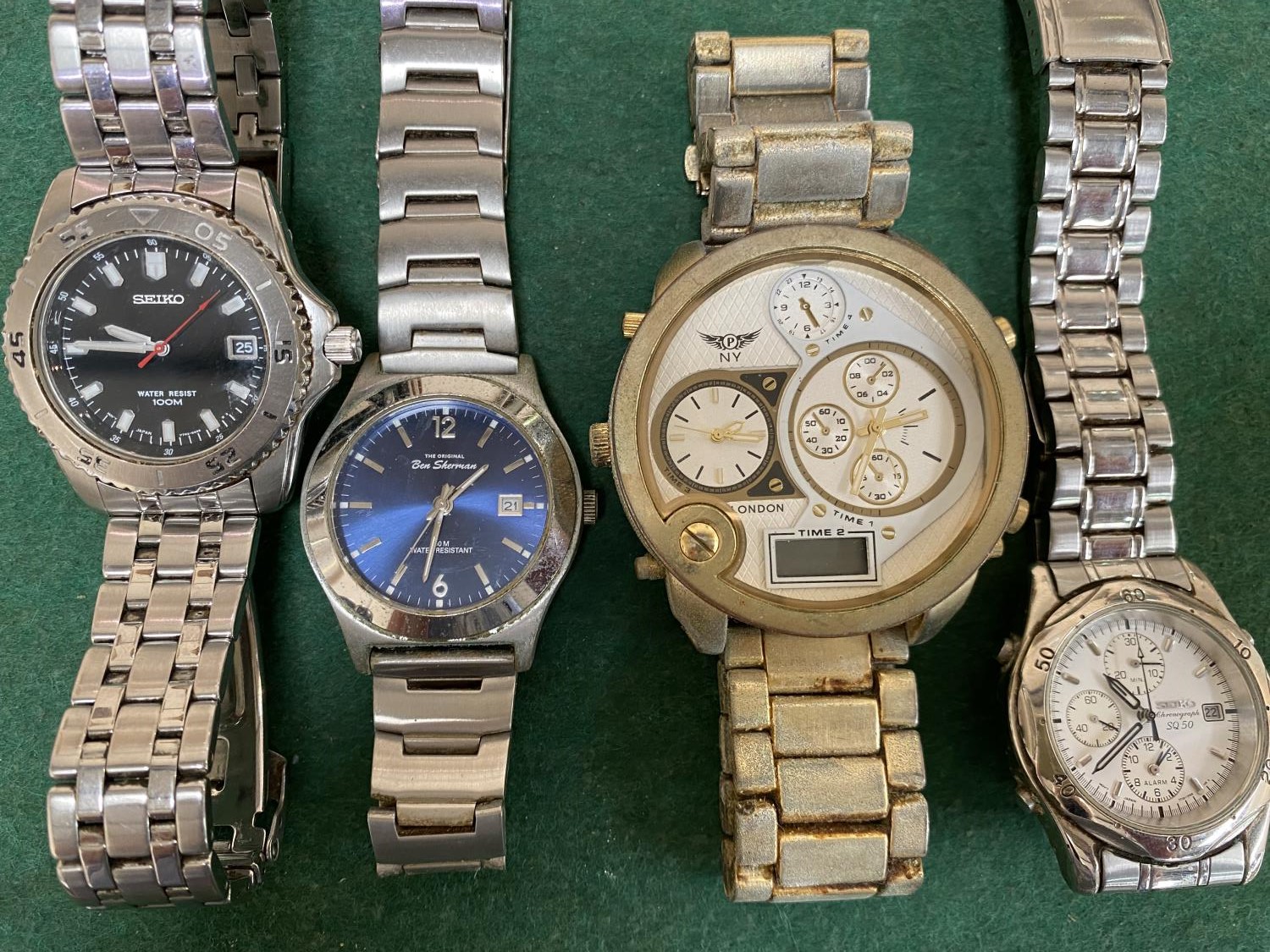 A Seiko SQ50 chronograph wristwatch; a Seiko alarm chronograph and 2 others