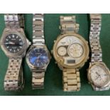 A Seiko SQ50 chronograph wristwatch; a Seiko alarm chronograph and 2 others