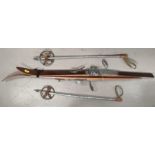 A pair of vintage Sport ALM children's skis and poles