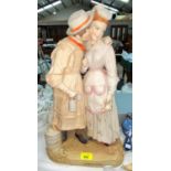 A coloured bisque group in the Victorian style "Taking the Cream", height 48 cm (restored)