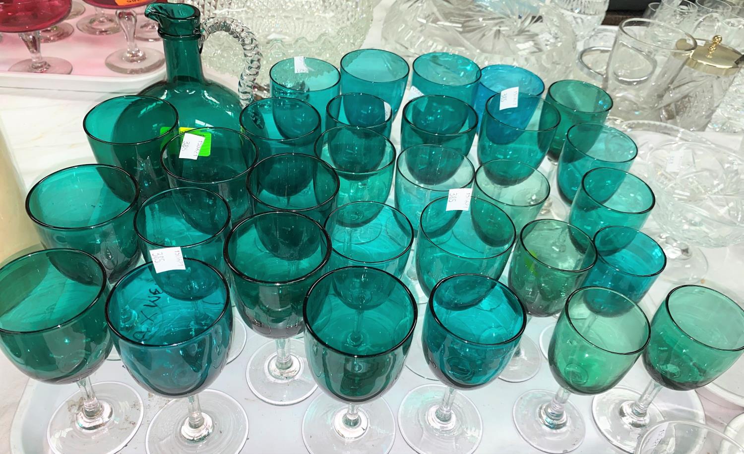 A Victorian turquoise glass wine jug; 35 approx similar wines - Image 2 of 2