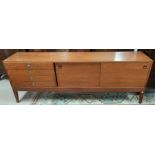 A mid 20th century teak long, low sideboard in the manor of Robert Heritage for Archie Shine with