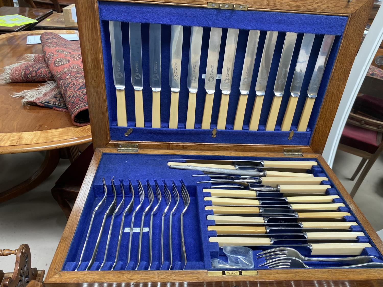 An Oak canteen on stand of silver plated cutlery with hinged lid, drawers below - Image 2 of 4