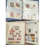 A collection of German stamps , four albums