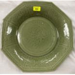 A Chinese green glaze Ming style octagonal charger with incised decoration of flowers dia 38cm